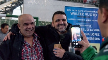 Vuoto junto a trabajadores del transporte y el comercio